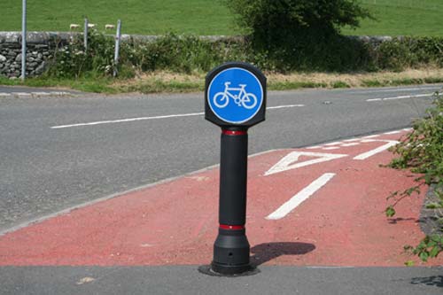 photograph of a cycle path with signage